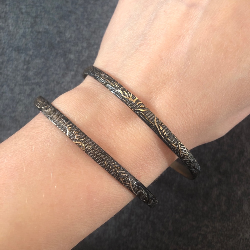 2 golden blackening bracelets with print